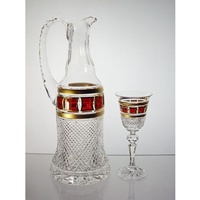 Carafe et 6 verres &agrave; liqueur. L'Or Rouge.